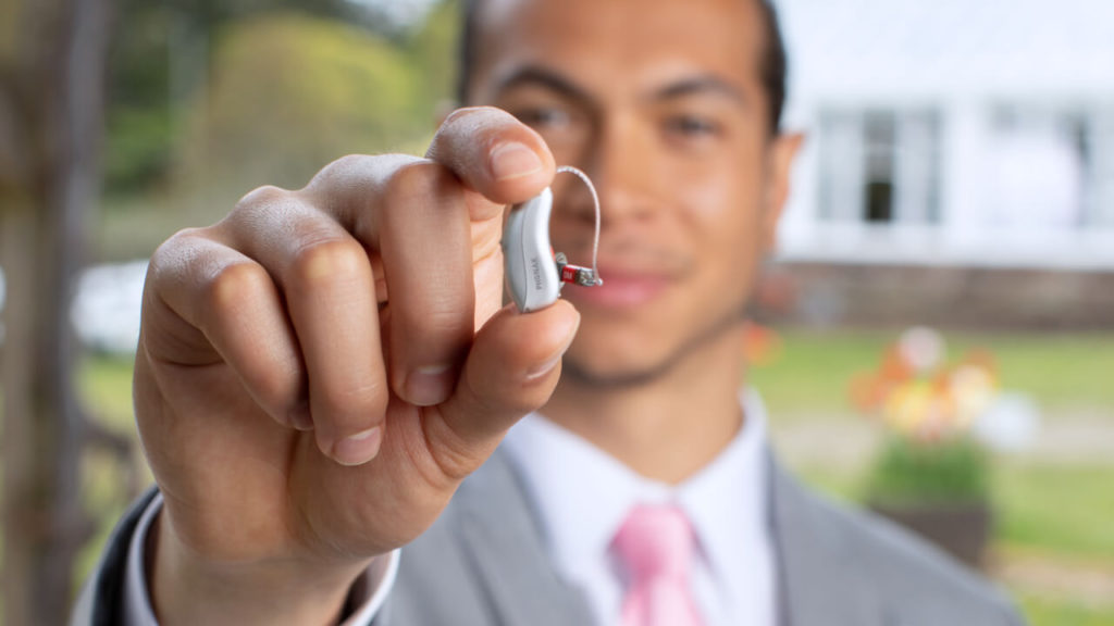 ph pic audeo l r lifestyle device between fingers 1024x576 1